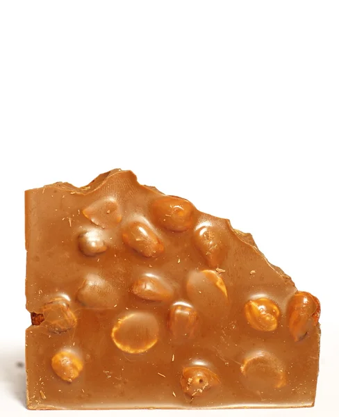 Chocolate com nozes no fundo branco — Fotografia de Stock