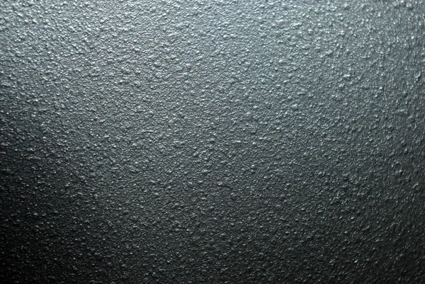 Black abrasive surface of the plastic close-up — Stock Photo, Image