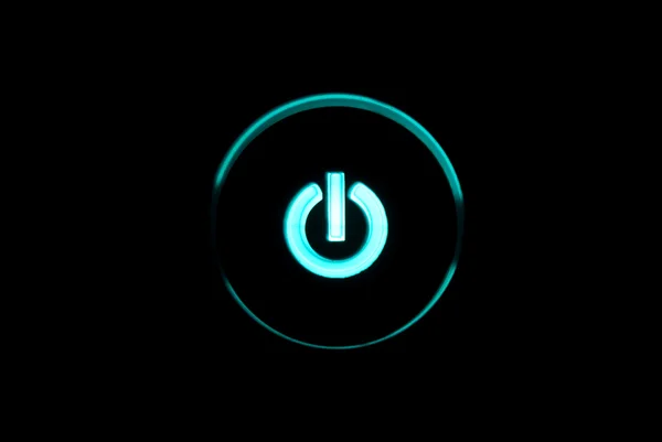 Monitor power button closeup in darkness — Stock Photo, Image