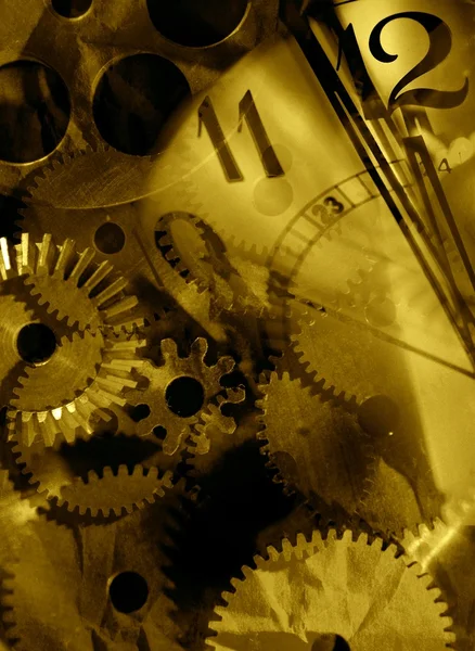 An abstract background is a gold clock-work — Stock Photo, Image