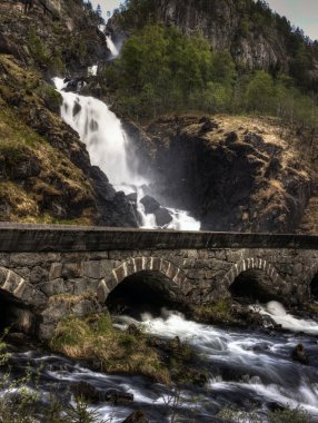 Waterfall and bridge in HDR clipart