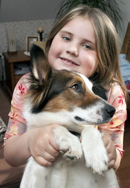 Young girl with dog — Stock Photo, Image