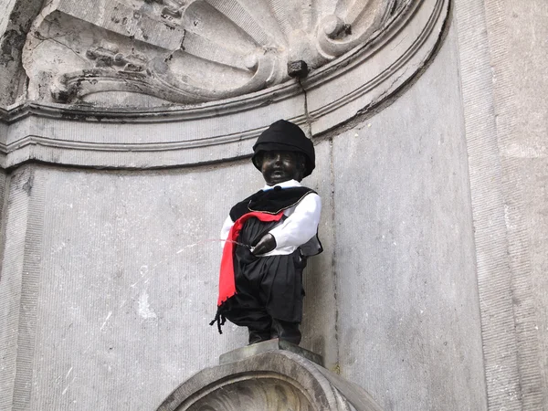 stock image Manneken pis with Cyprus Suit at Brussels , Belgium