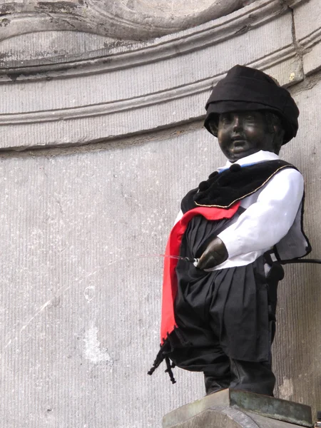 stock image Manneken pis with Cyprus Dressing at Brussels in Belgium