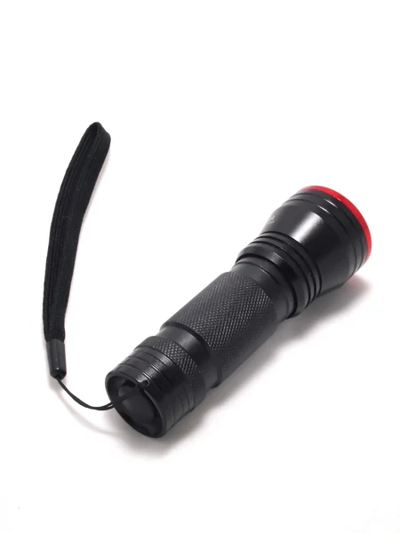 Pequena lanterna LED preto, interruptor de botão — Fotografia de Stock
