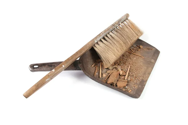 Brush and shovel with dust — Stock Photo, Image