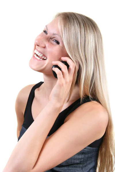 Μια νεαρή γυναίκα μιλάει στο τηλέφωνο. — Φωτογραφία Αρχείου
