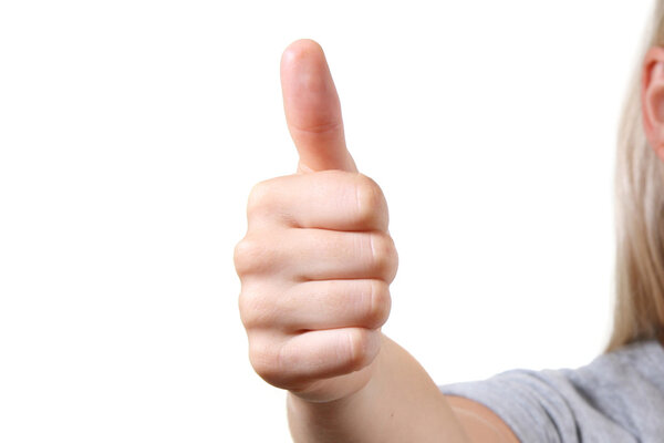 Woman with thumbs up. isolated on white