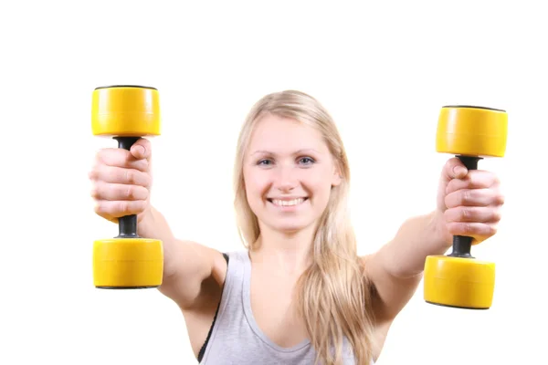 Smiling woman with dumbbells in her hands — Stock Photo, Image