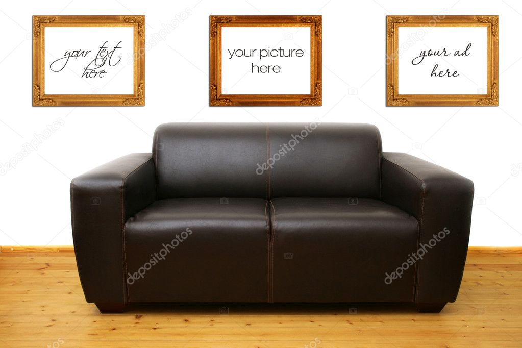 Brown leather sofa and blank photo frames on the wall