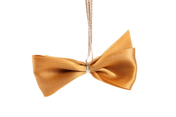 Golden bow isolated on white — Stock Photo, Image