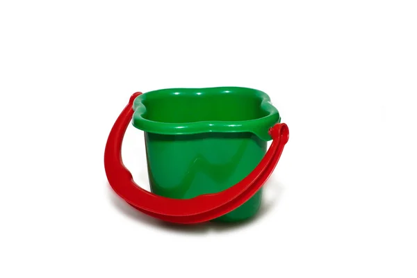 Hračka kbelík na bílém pozadí — Stock fotografie
