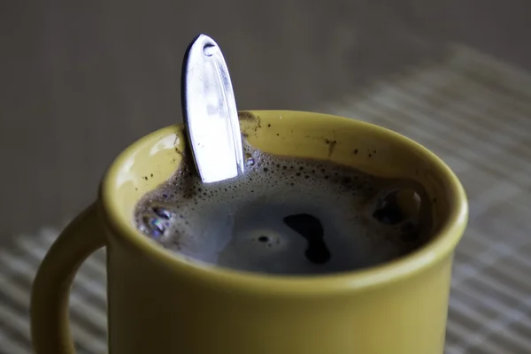 Kubek kawy z łyżeczką Zdjęcie Stockowe