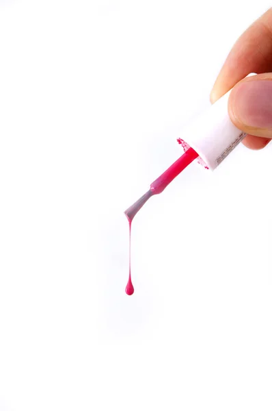 Dripping nail polish from the brush — Stock Photo, Image
