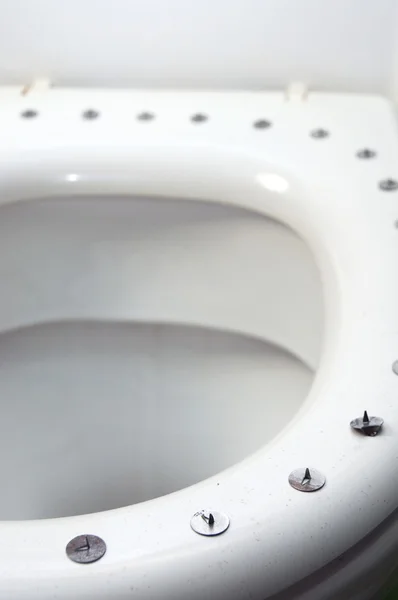 stock image Metall circle sharp buttons on the top of toilet