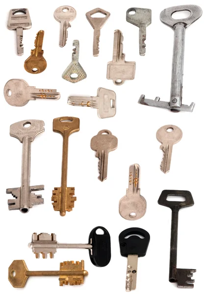 Coleção de 19 chaves branco isolado — Fotografia de Stock