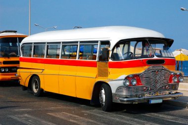 One of the yellow Malta bus. Gozo. Malta clipart