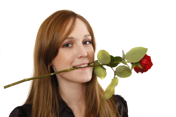 stock image Portrait of young woman with flower