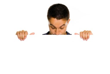 Potrait of a young guy holding blank billboard clipart