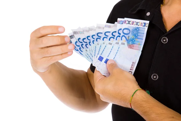 Man visar euro räkningar, studio skott — Stockfoto