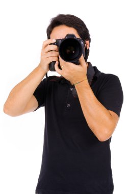 genç erkek photograher Studio, üzerinde beyaz izole