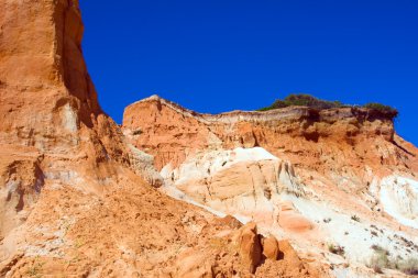 Red montains in Algarve, south of Portugal clipart