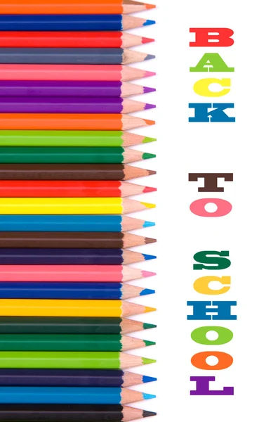 Kolorowe kredki na białym tle, powrót do szkoły — Zdjęcie stockowe