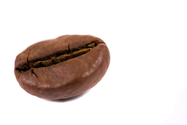 Macro shot of a coffee bean, isolated on white — Stock Photo, Image