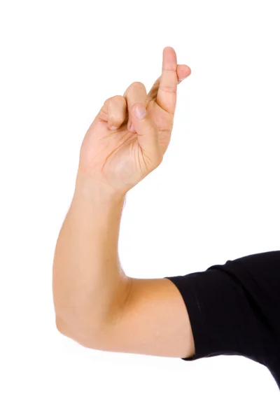 Uma mão com os dedos cruzados, isolado em branco — Fotografia de Stock