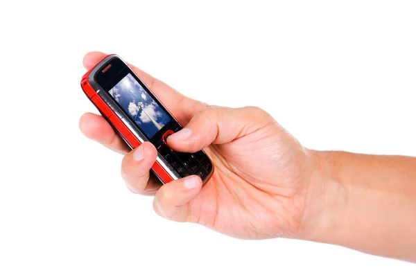 Мобильный телефон в руке, изолированный над белым — стоковое фото