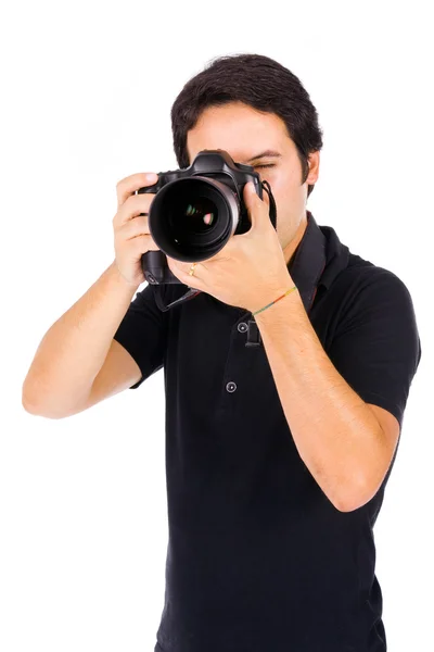 Ung manlig fotograf på studio, isolerad på vit — Stockfoto