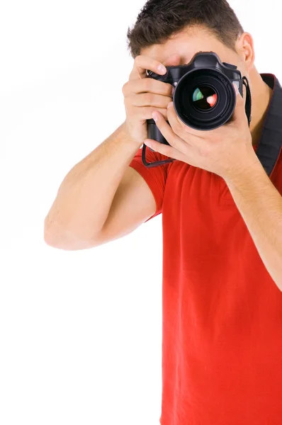Ung manlig fotograf på studio, isolerad på vit — Stockfoto