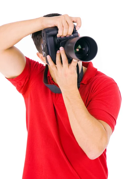 スタジオでは、白で隔離される若い男性カメラマン — ストック写真