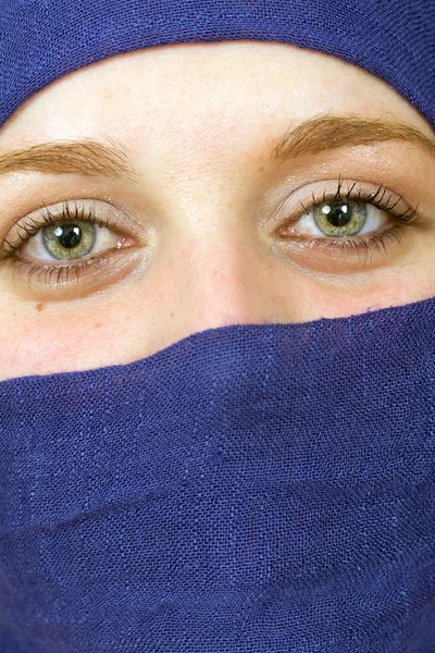 Close-up portrait a woman with blue vell, arabic style — Stock Photo, Image