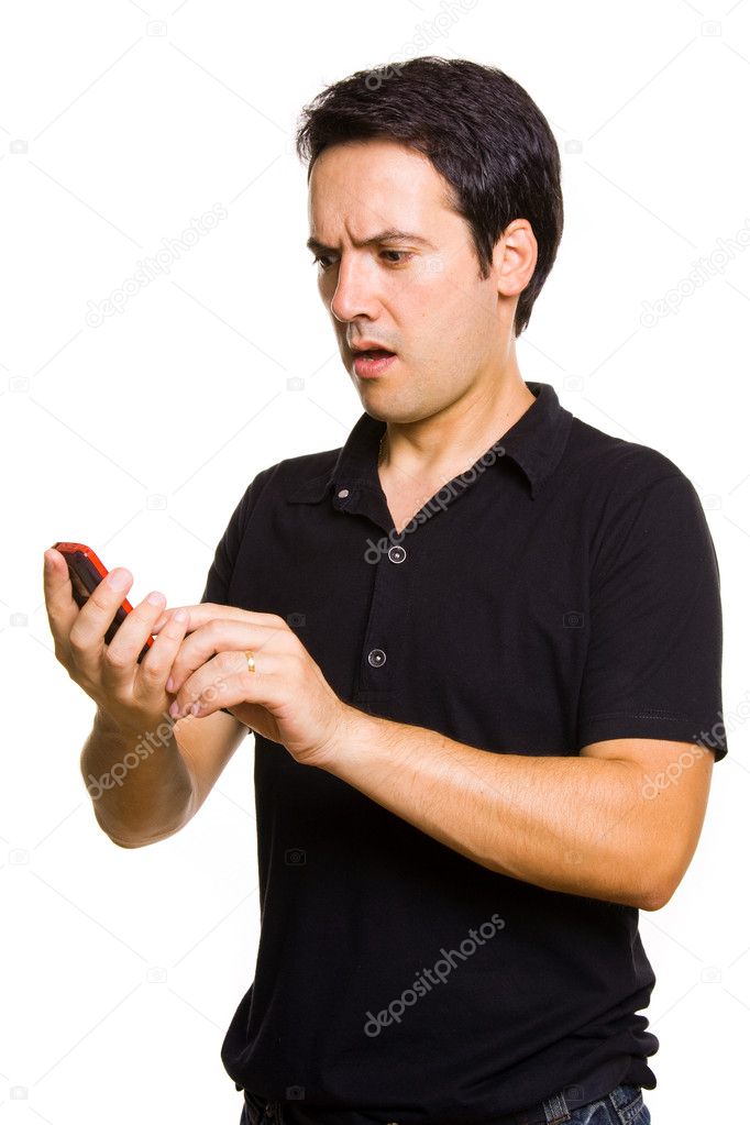 Young man with bad news on is cellphone