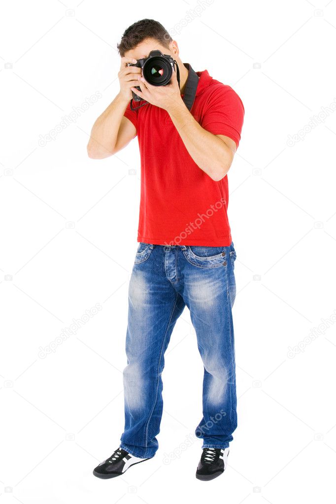 Young photographer with camera, isolated on white