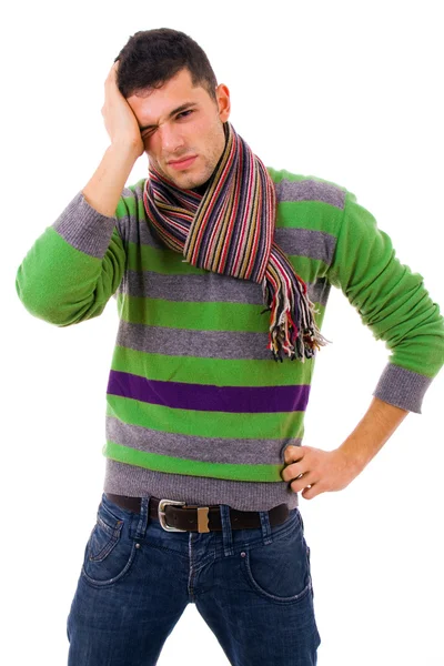 Young casual man with a headache, isolated on white — Stock Photo, Image