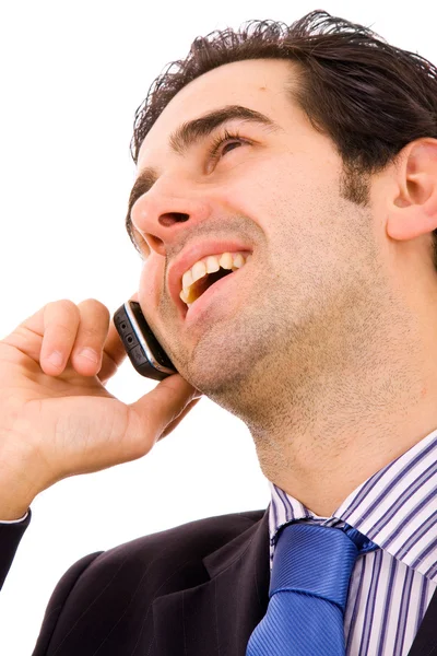 Счастливый молодой привлекательный бизнесмен по телефону, изолированный на белом — стоковое фото