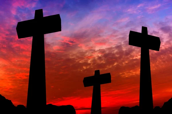 Crosses silhouette over a dramatic sky at sunset — Stock Photo, Image