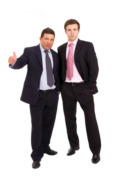 Портрет двух бизнесменов, стоящих на белом фоне — стоковое фото