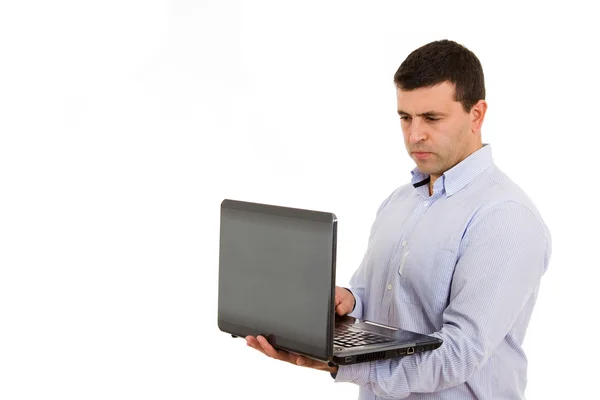 Uomo che lavora con un computer portatile — Foto Stock