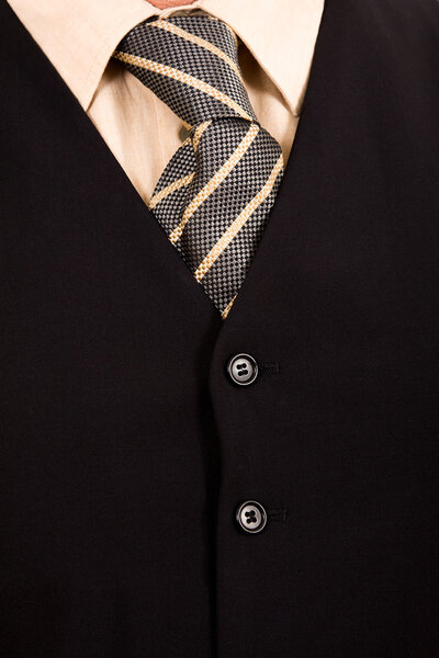 Detail of a business man with colored tie