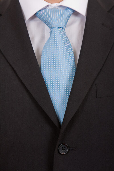 Detail of a business man with blue tie