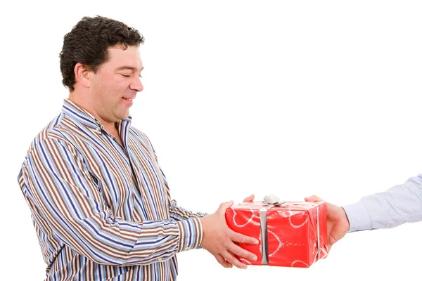 Happy mature man receives a gift — Stock Photo, Image