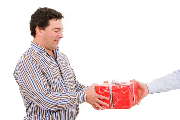 Happy mature man receives a gift — Stock Photo, Image