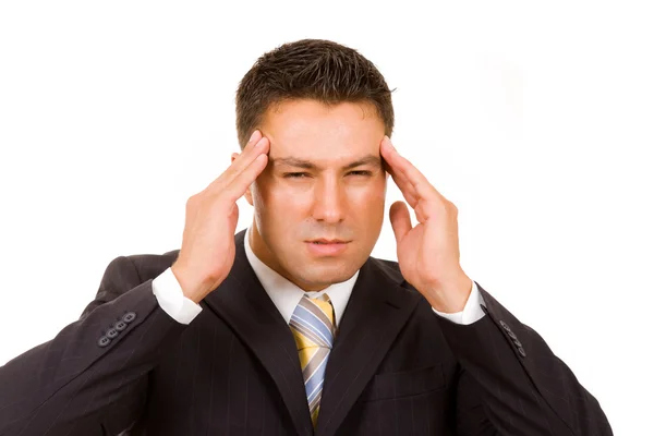 Giovane uomo d'affari in agonia con mal di testa — Foto Stock
