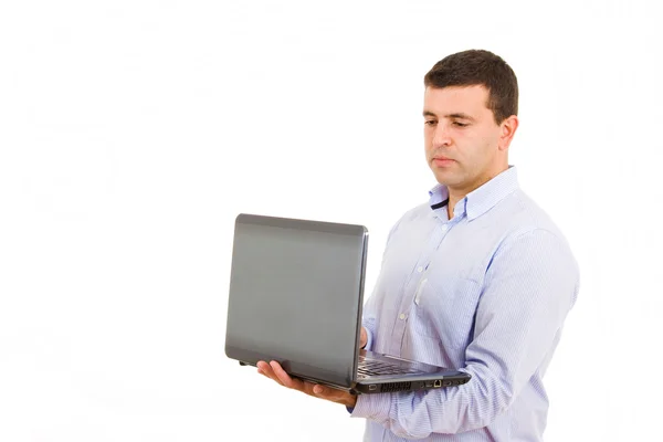 Uomo casual che lavora con un computer portatile — Foto Stock