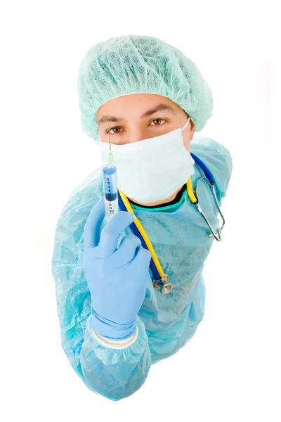 年轻的外科医生用注射器 在白色背景上孤立 — 图库照片