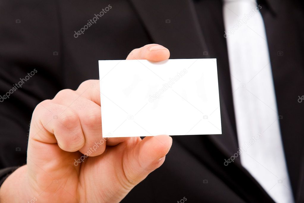 Close up of businessman hand offering businesscard