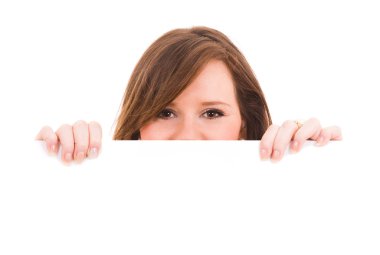 Picture of beautiful brunet woman holding a blank billboard clipart